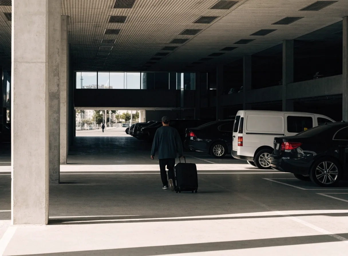 Covered multi-level car park lane inside the terminal-side structure at Brisbane Airport domestic